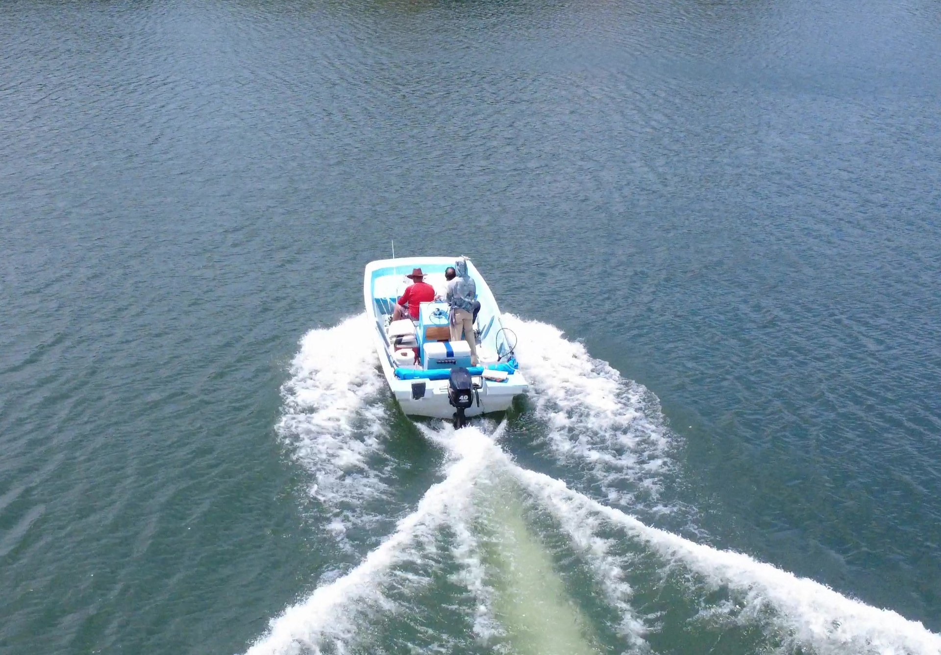 PanalakeSportfishing custom 18ft Boston Whaler inspired fishing boat leaving the dock on Gatun Lake, Panama