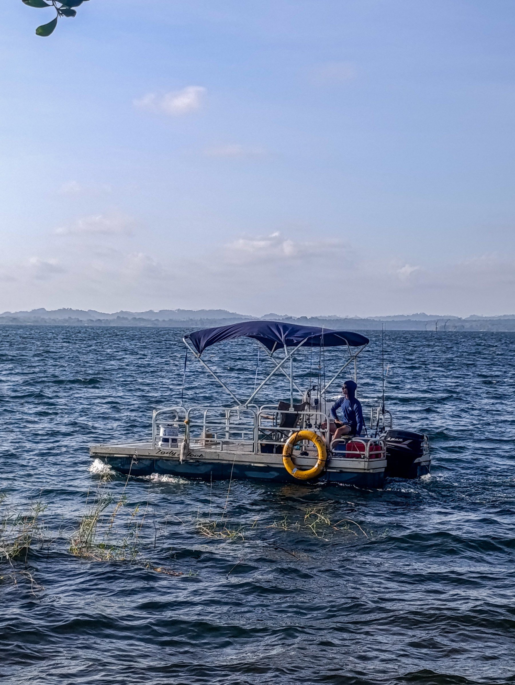 Lady Hook, custom 18x8 pontoon fishing boat on Gatun Lake, Panama